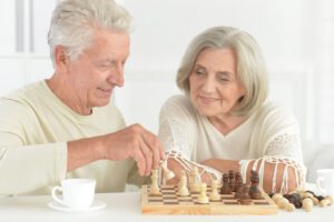 Senior Couple Playing Chess_Memory Care in Sarasota