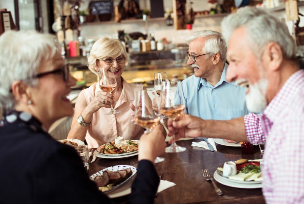 Sarabella Swirl and Savor - Group of Seniors Enjoy Food and Wine