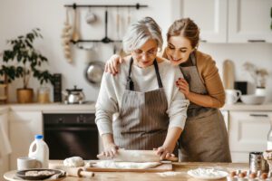 Senior Woman and Adult Daughter Baking_Benefits of Routine