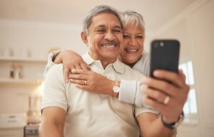 Older adults holding a smartphone