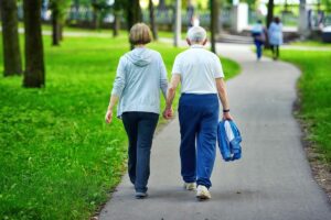 Two senior women walking together